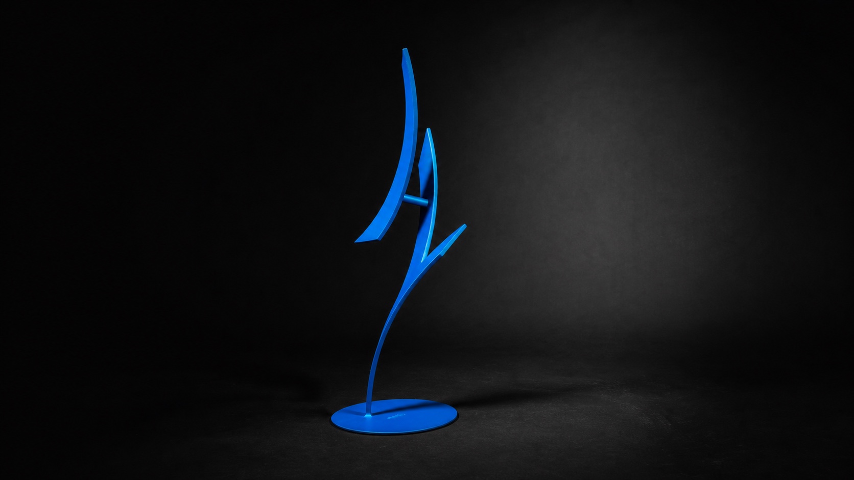 Blue abstract steel sculpture by Miguel Edwards